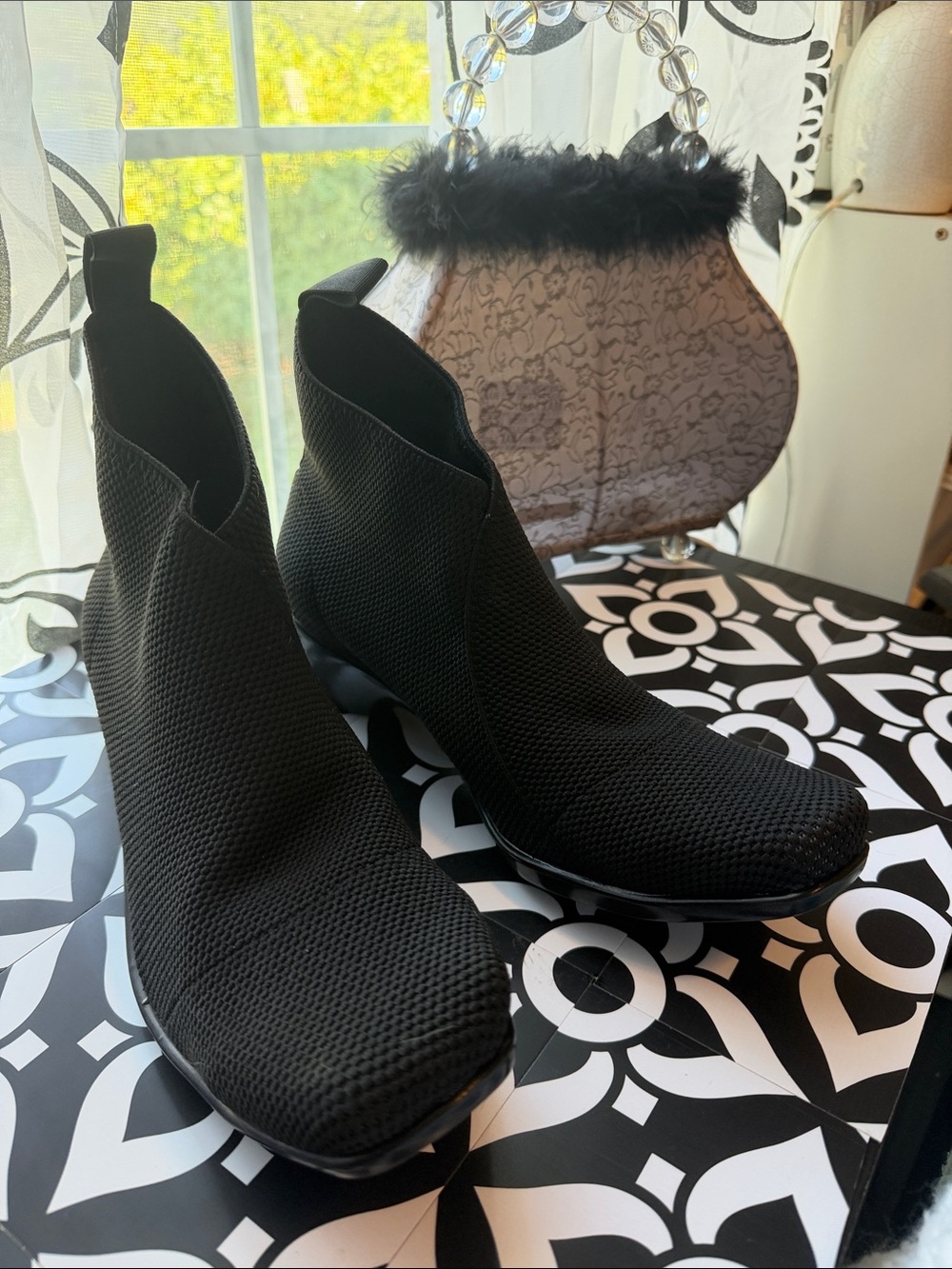 CHARLESTON SHOE CO. Black Knit Slip-On Wedge Ankle Booties